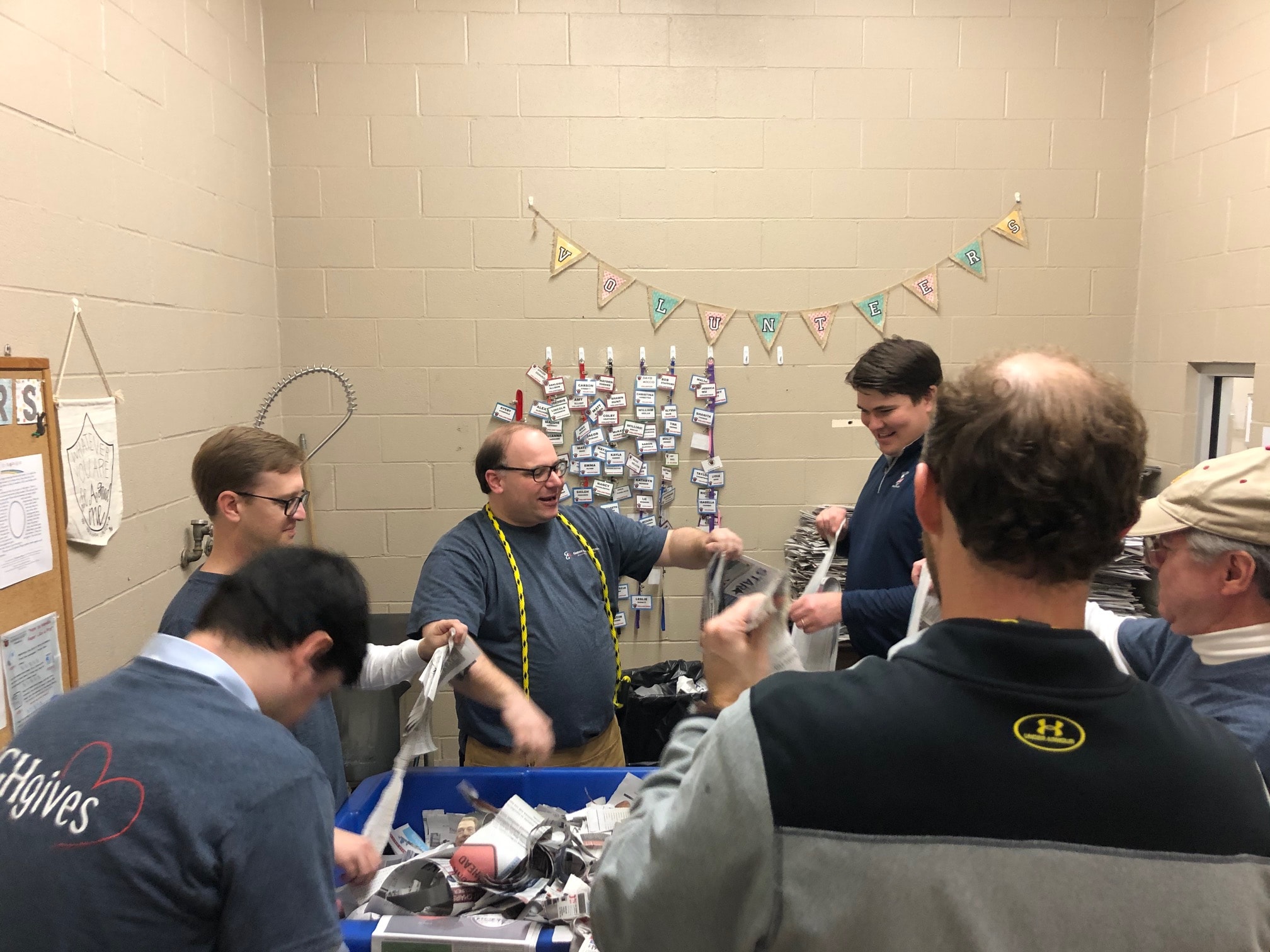 a group of people standing in a room