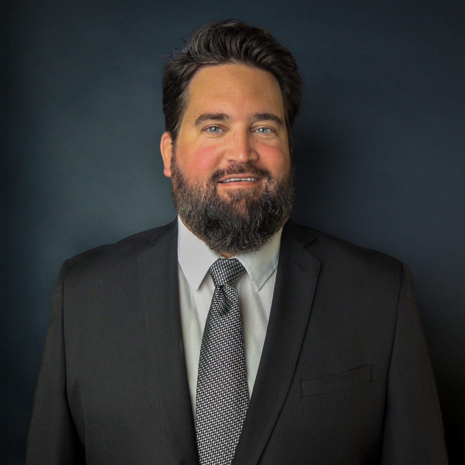 a man wearing a suit and tie