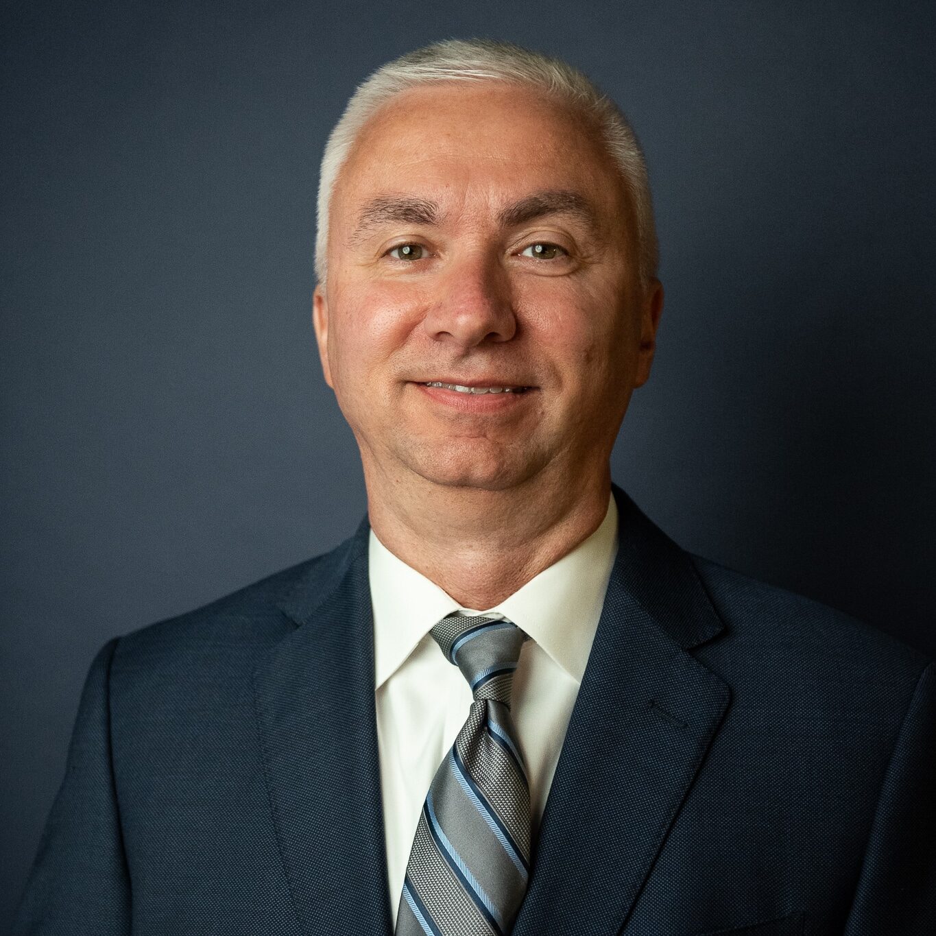 a man wearing a suit and tie