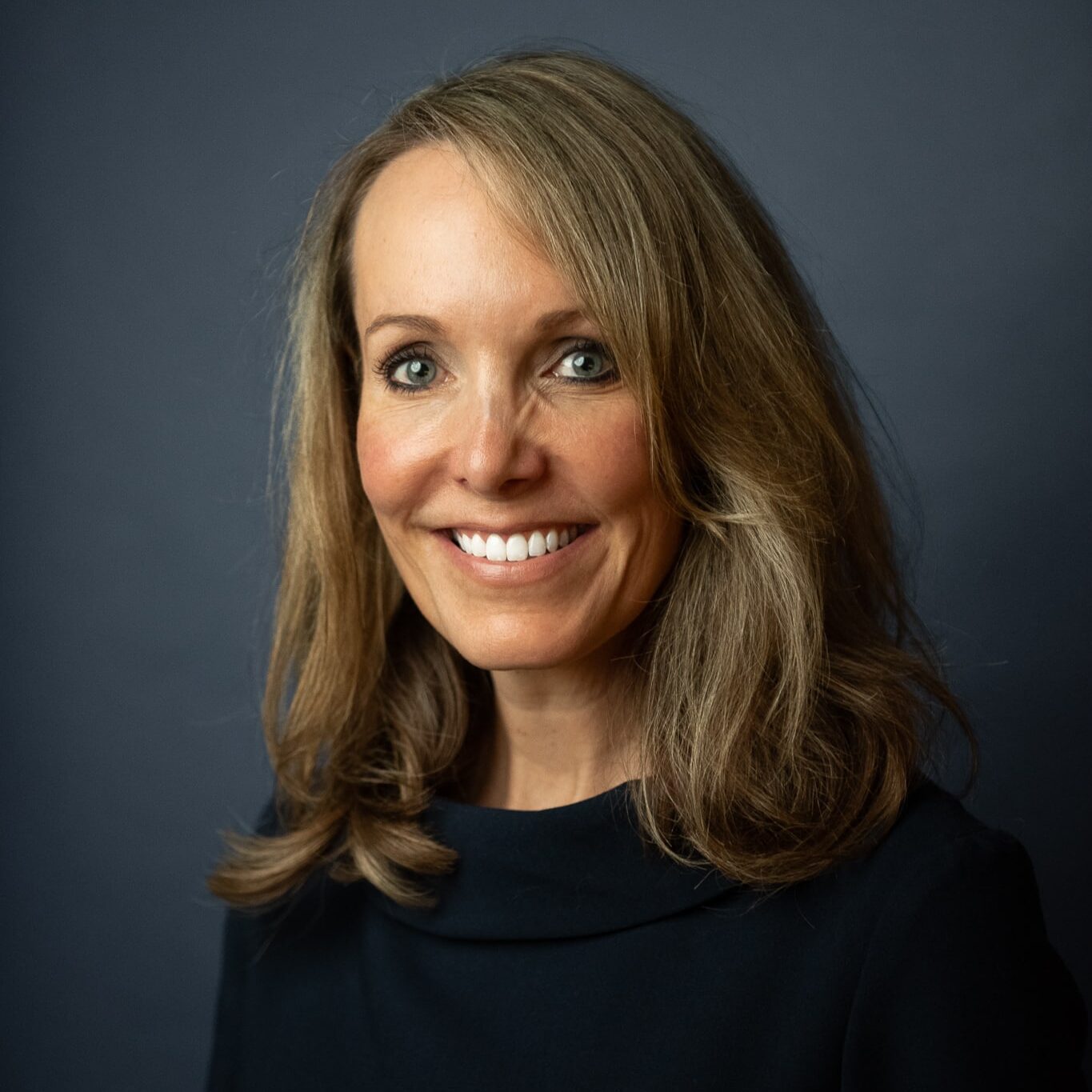 a person smiling for the camera