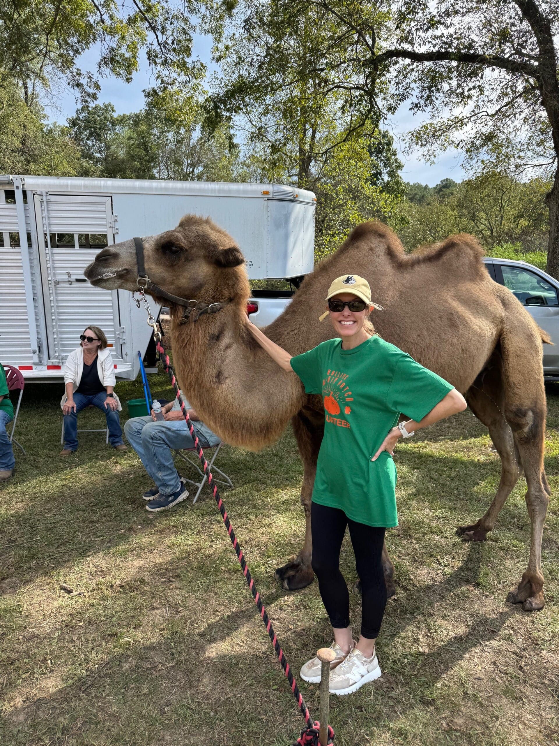 a group of people that are standing in the grass