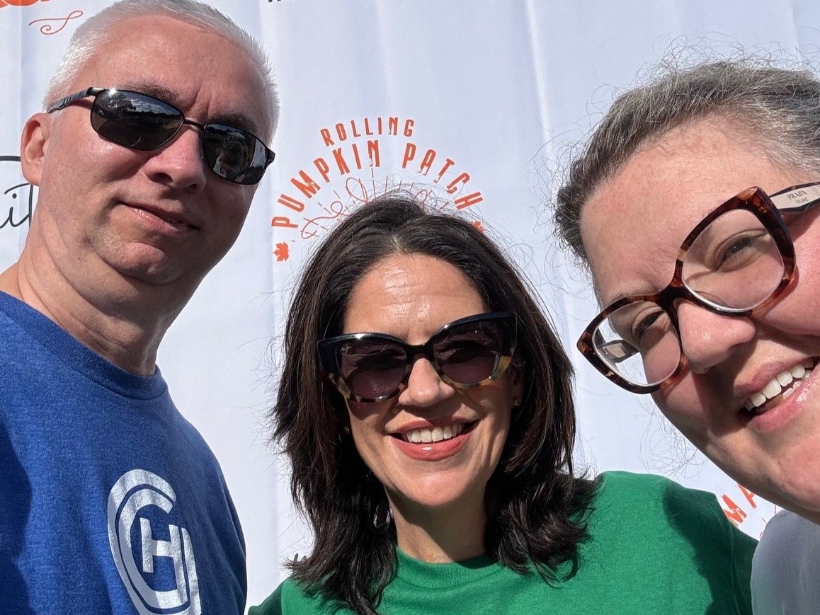 a person wearing sunglasses posing for the camera